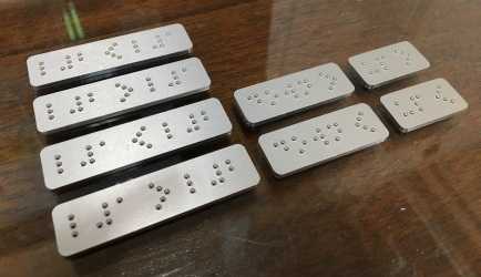 BCA handrail Braille example